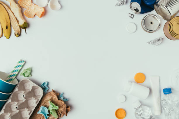 istock flat lay with arranged different types of garbage isolated on grey 914827314