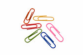 Six paper clips on a white background