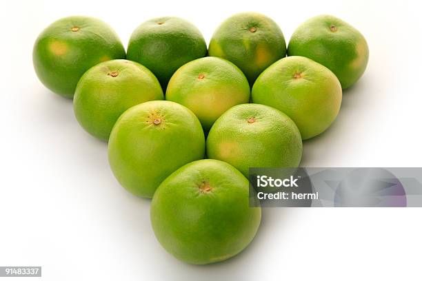 Foto de Verde Grapefruits No Fundo Branco e mais fotos de stock de Amarelo - Amarelo, Brilhante - Luminosidade, Colorido