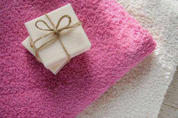 A gift wrapped block of homemade soap made from Lavender.