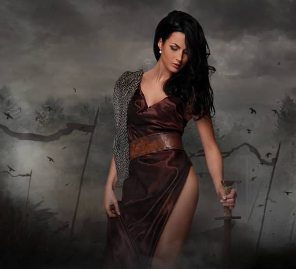 istock brunette female in a war queen costume. 914835706