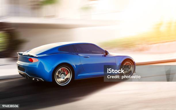 Blue Sports Car Driving On Urban Scene Stock Photo - Download Image Now - Car, Blue, Sports Car