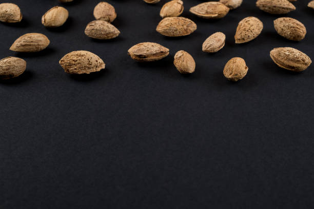 istock Heap of pistachios on black 914846950
