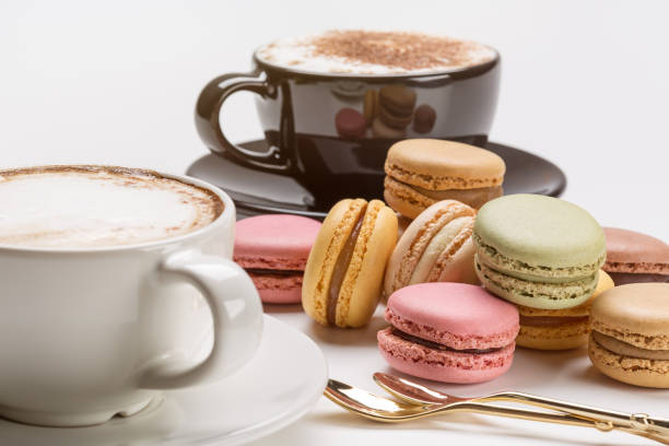 istock Cappuccino and French macaroons. 914847348