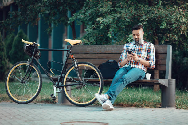 istock Casual Businessman Checking Social Media 914847364