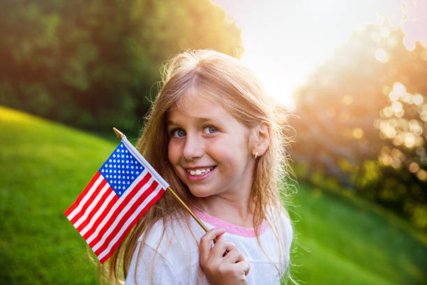 istock American Girl with a Flag 914851790
