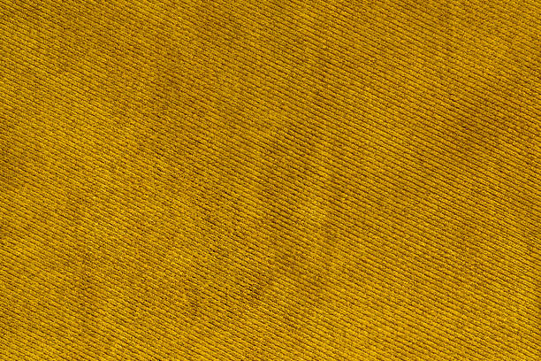 gelb gold stoff gewebt textur makro hintergrund - wool thread textile textured stock-fotos und bilder