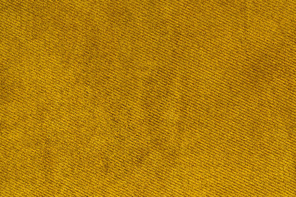 yellow gold fabric woven texture macro background - wool thread textile textured imagens e fotografias de stock