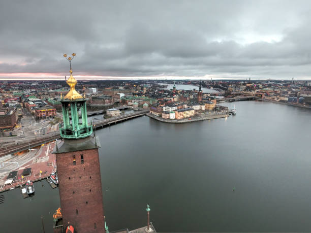 Gothenburg, Sweden - september 18 2024: Fog hiding Karlatornet high rise in morning sun.