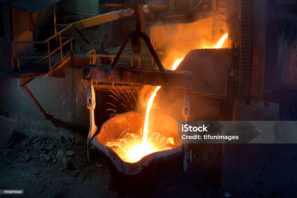 Pouting molten copper Pouting molten copper at a Copper Mill in Chile Copper Stock Photo