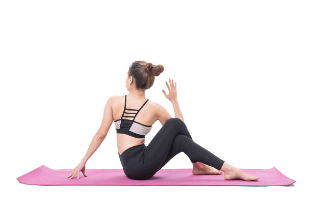 istock Woman practicing yoga isolated on white background 914872434