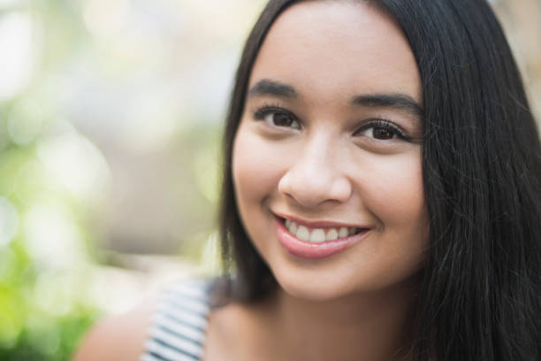 istock Happy young woman portrait 914875202