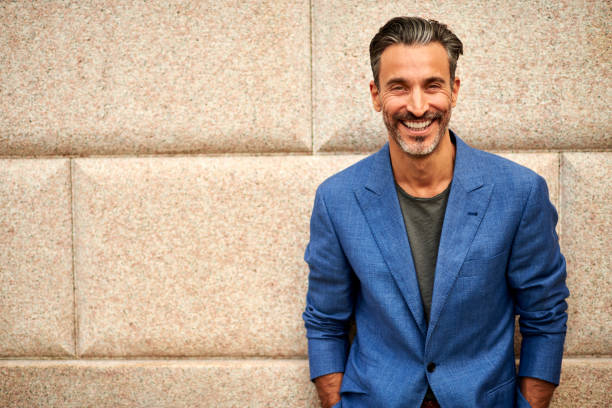 istock Portrait of handsome man looking at camera 914875840