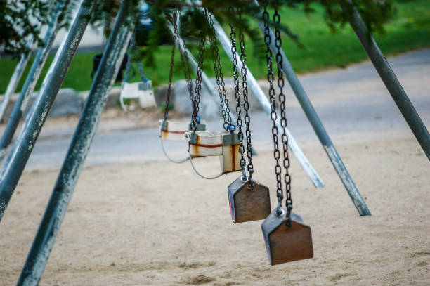istock Old swings at the park. 914875930