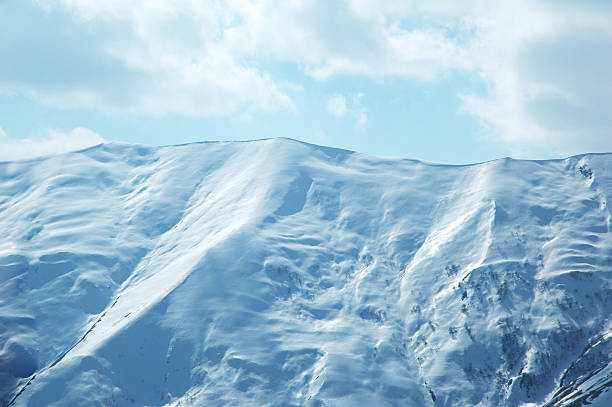 istock High mountains under snow in the winter 91488276