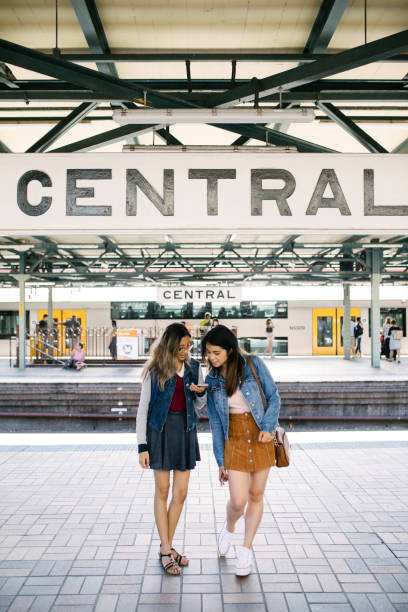 istock Asian hipsters in Sydney central train station 914883174