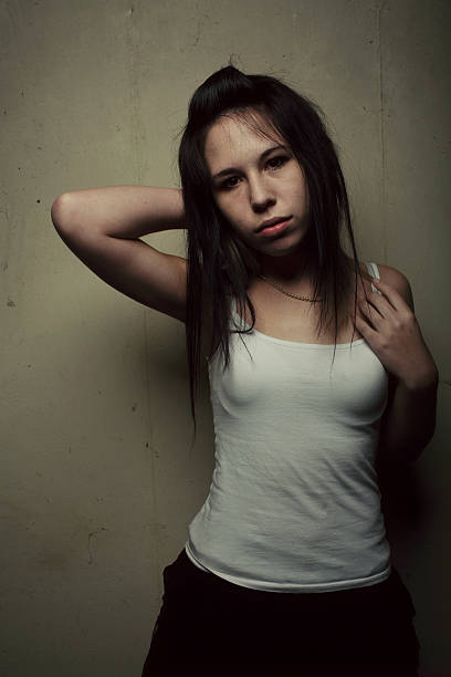 istock Teel Girl in White at Grimy Night House 91488450