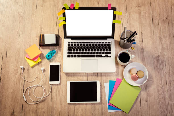 istock Workspace With Coffee Cup And French Macaroons 914886844