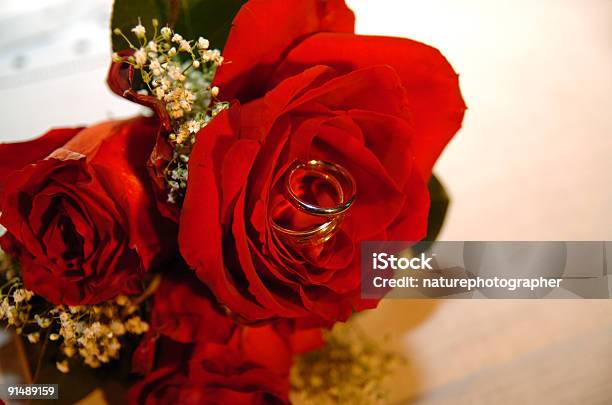 Wedding Bands And Bridal Bouquet Stock Photo - Download Image Now - Bouquet, Bride, Color Image