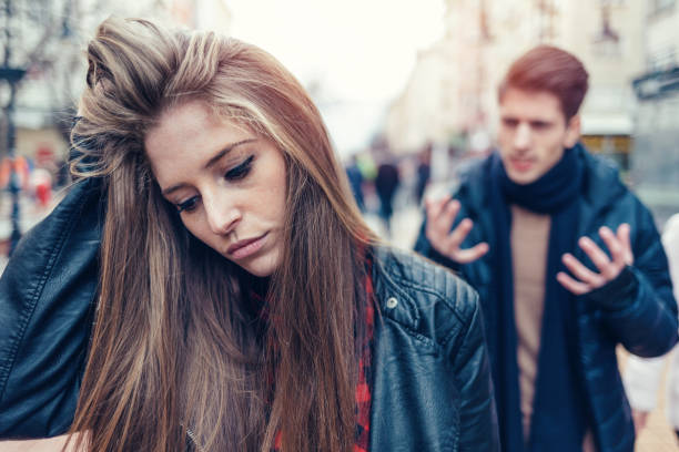 istock Sad woman turning back to her boyfriend 914891722
