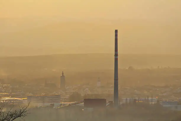Centre of city Ceske Budejovice in winter sunset and fog
