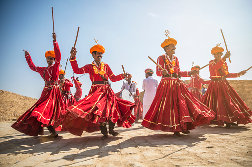 Dandi Gair is a popular traditional welcoming dance in Rajasthan. Here it is performed to welcome tourists at the 2018 Jaisalmer Desert Festival.