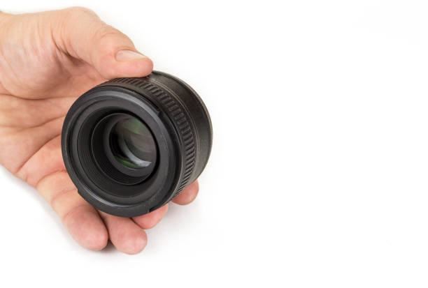 istock Zoom and fix lenses on camera on the white background 914895466