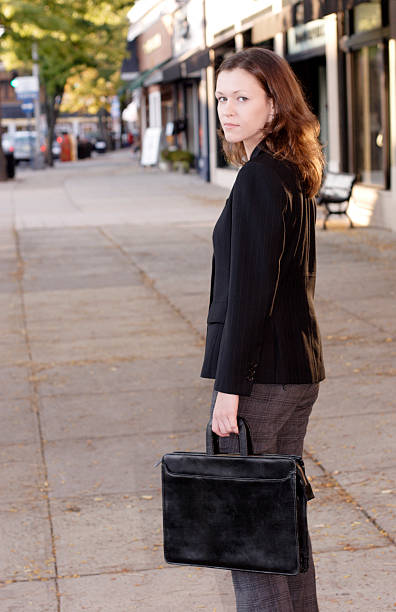 istock Young Businesswoman with Valise 91489765