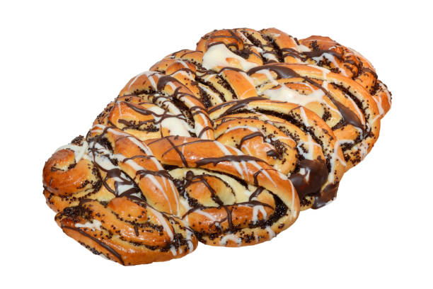istock Chocolate sponge roll with poppy seeds isolated on white background 914899998