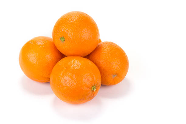 istock Fresh juicy oranges with halves on the white background 914900236