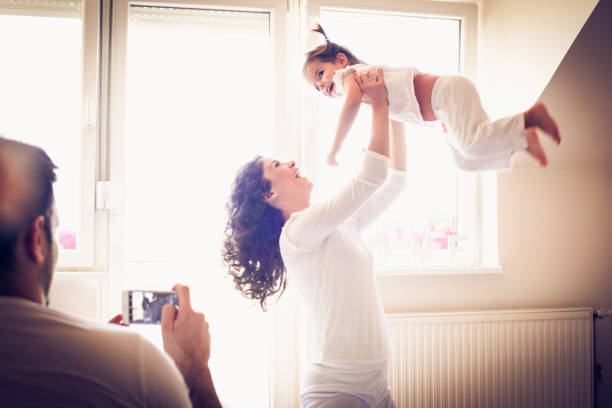 istock Morning playing with mommy is important to shooting. 914900820