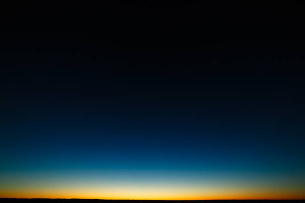 istock Bright sky above the horizon after sunset. Clear cloudless space. 914901274