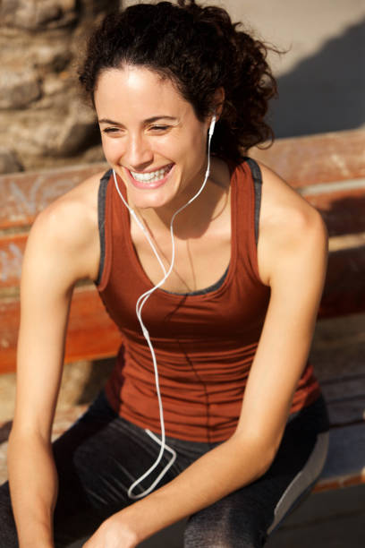 istock happy young woman resting after workout 914901524