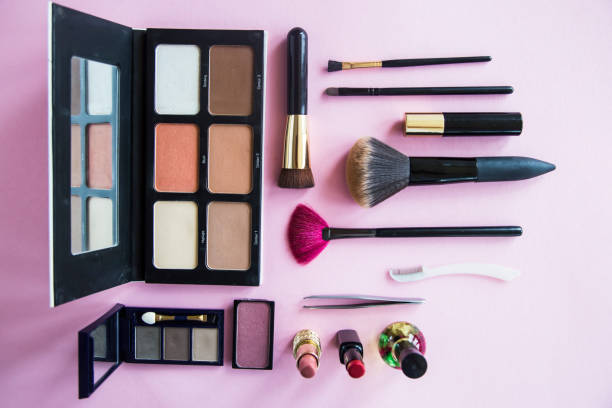 istock Decorative cosmetics for a woman's make-up on a pink background 914904588