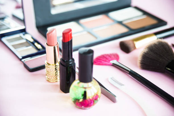 istock Decorative cosmetics for a woman's make-up on a pink background 914904602