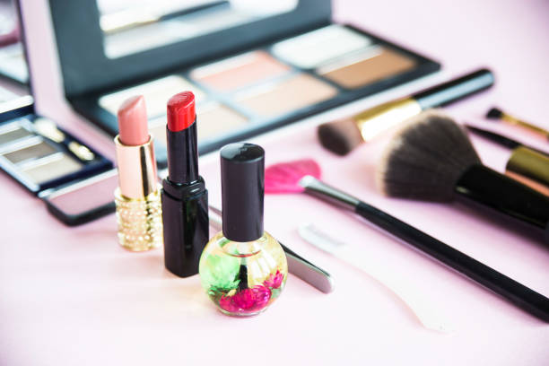 istock Decorative cosmetics for a woman's make-up on a pink background 914904612