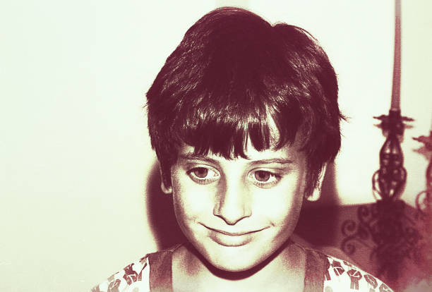 istock Vintage black and white smiling boy 914904788