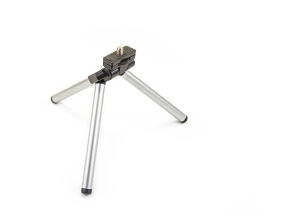istock Small tripod for smartphone or light cameras on the white 914905370