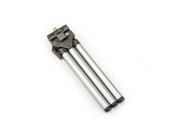 istock Small tripod for smartphone or light cameras on the white 914905602
