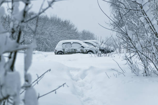 istock Cars are covered with snow 914909076