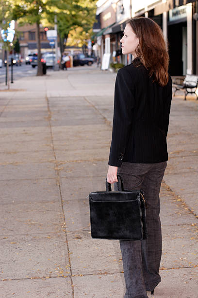 istock Young Businesswoman with Valise Profile 91491064