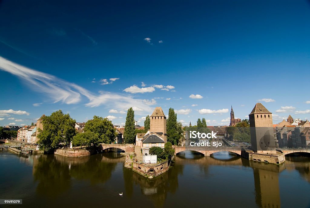 View on Strasbourg View on the city of Strassbourg in France with a blue sky and water. Strasbourg Stock Photo