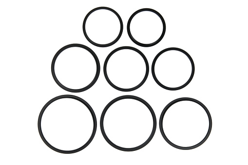 Aluminium camera lens filter ring adapters 49mm to 82mm isolated on white
