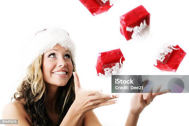 Christmas Woman With Falling Gifts Stock Photo - Download Image Now - Adult, Adults Only, Beautiful People