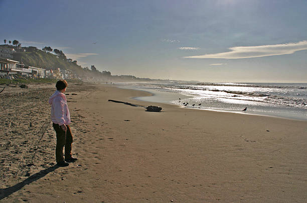 istock Woman at a California beach in winter 91492532