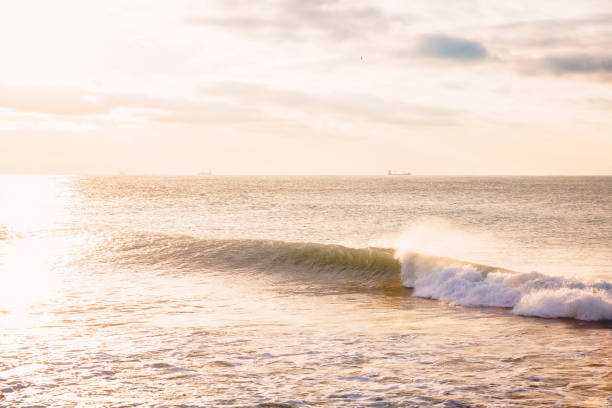 istock Perfect ocean wave. Landscape with sunrise or sunset colors 914929448