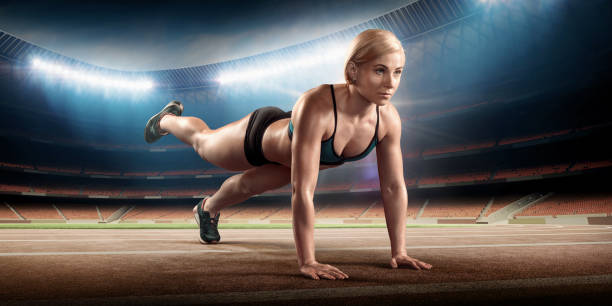 istock Muscular and strong woman doing push-ups 914940484