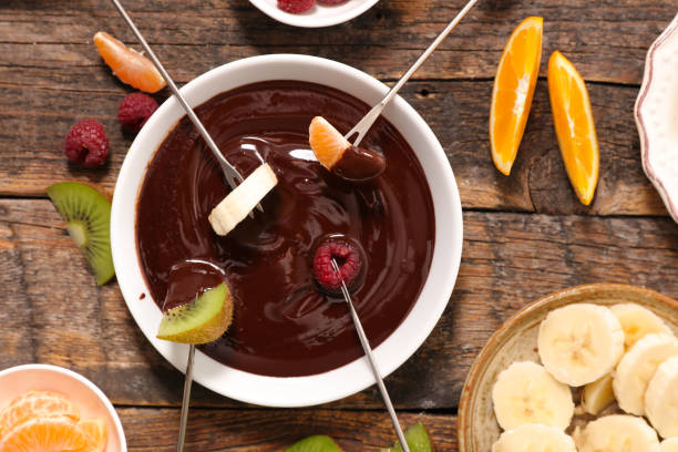 istock chocolate fondue with fruits 914940822