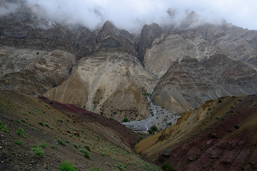 Trekking on Markha valley trek route in Ladakh, Karakorum panorama. This region is a purpose of motorcycle expeditions organised by Indians