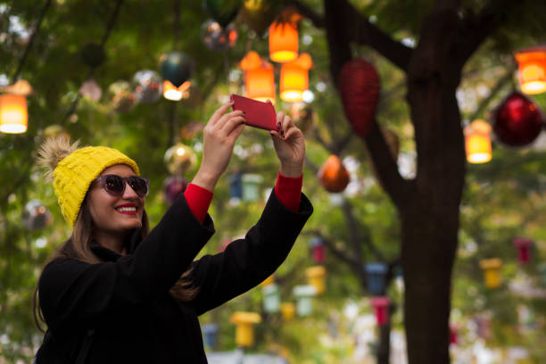 istock Smiling woman for selfie 914948308